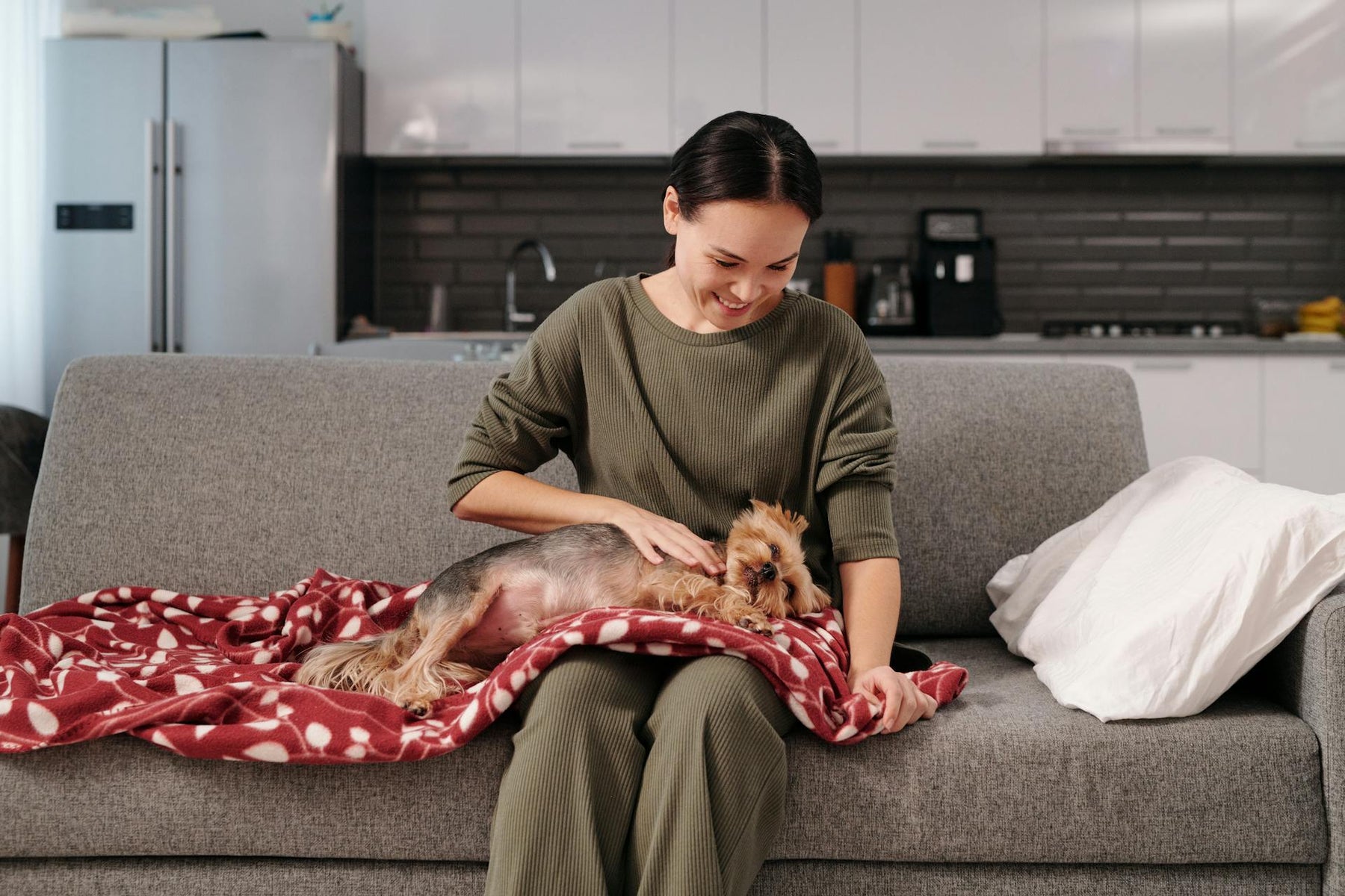 Is Authentic Leather or Premium Performance Fabric Better for Homes with Pets and Kids?