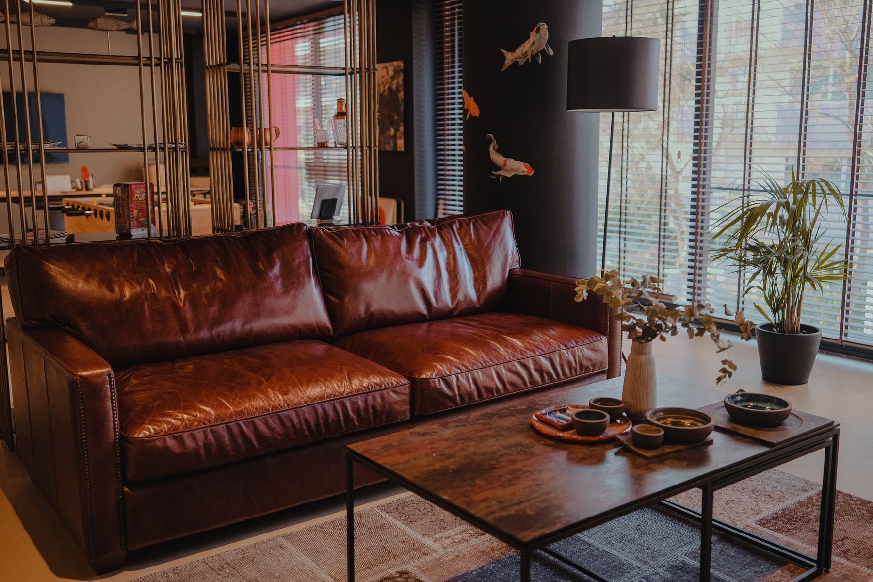Is Authentic Leather or Premium Performance Fabric Better for Homes with Pets and Kids?