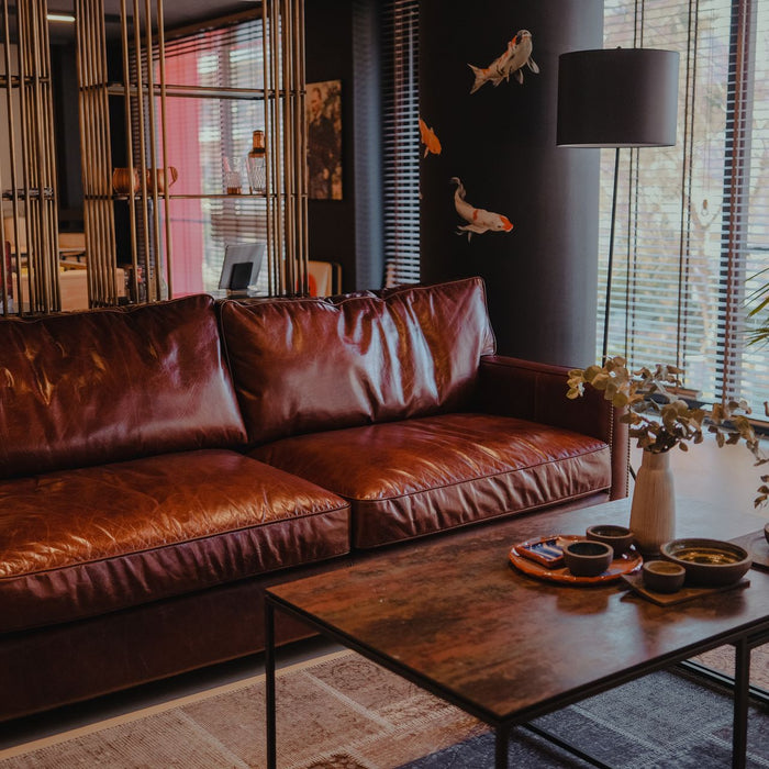 Is Authentic Leather or Premium Performance Fabric Better for Homes with Pets and Kids?