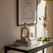 10-sitting-figure-w-open-cut-out-sand-glaze-ivory-10