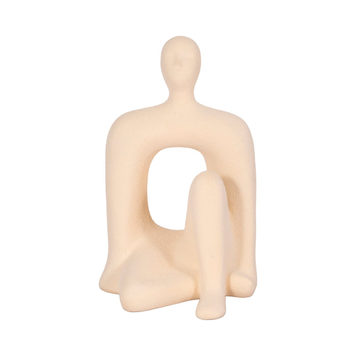 10-sitting-figure-w-open-cut-out-sand-glaze-ivory-1