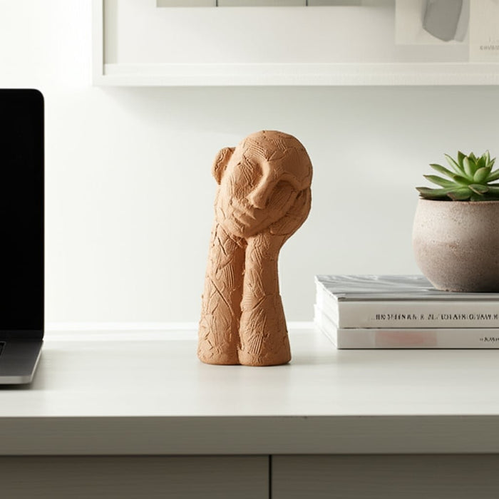 11-resting-head-on-hand-figure-tan-11