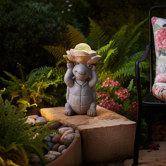 15x9-turtle-holding-large-solar-flower-grey-mult-10