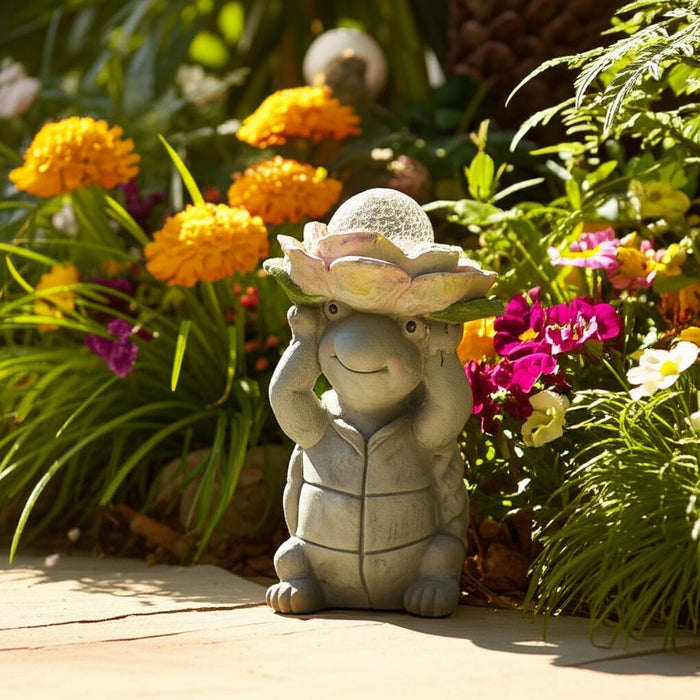 15x9-turtle-holding-large-solar-flower-grey-mult-12