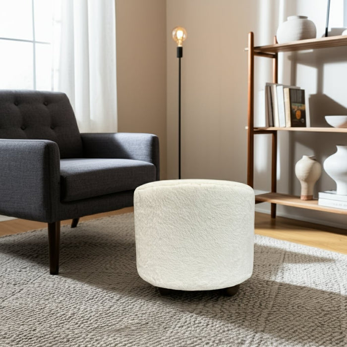 20-faux-fur-ottoman-w-ball-feet-ivory-10