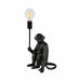 20-monkey-with-lightbulb-table-lamp-black-1