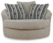 calnita-oversized-swivel-chair-and-ottoman-6