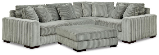 lindyn-4-piece-sectional-and-ottoman-1