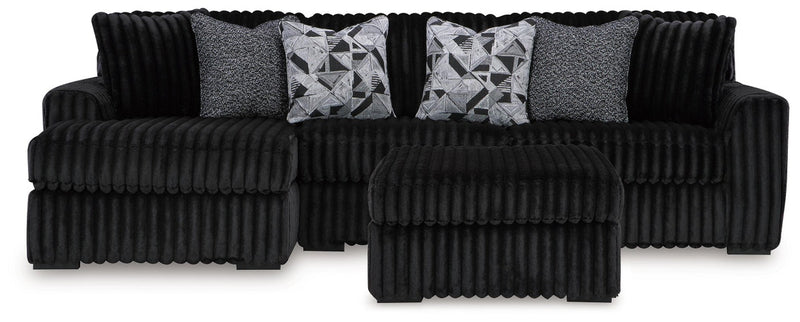 midnight-madness-2-piece-sectional-and-ottoman-1
