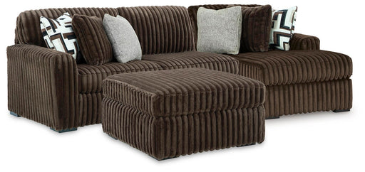 midnight-madness-2-piece-sectional-and-ottoman-1
