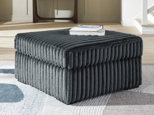 midnight-madness-3-piece-sectional-and-ottoman-2