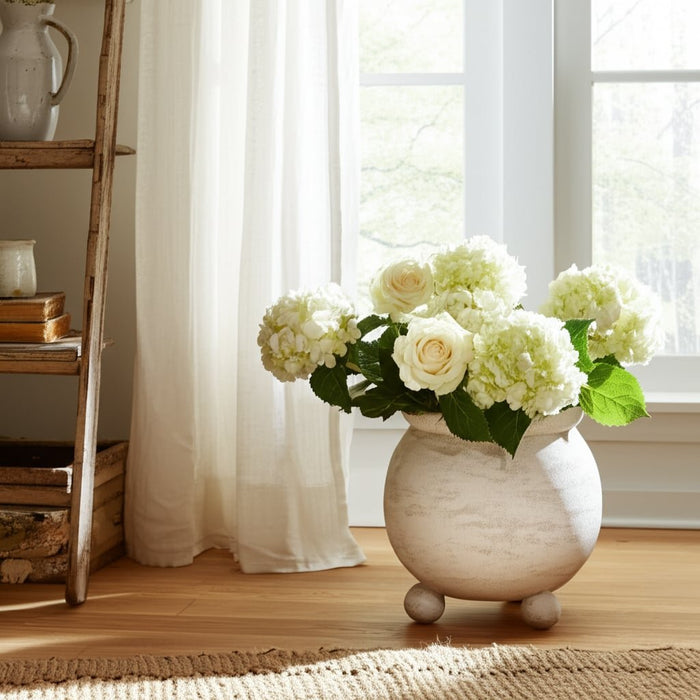 9x9-textured-rounded-planter-on-ball-feet-ivory-6