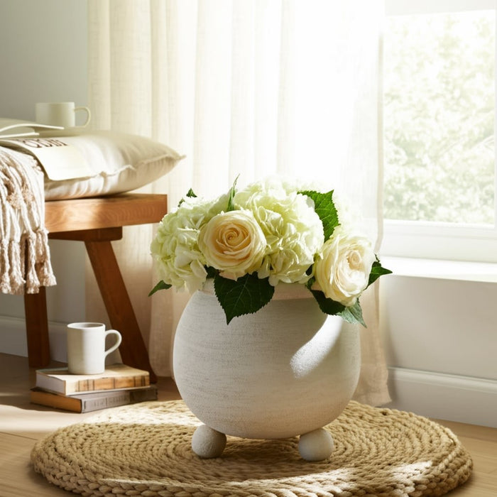 9x9-textured-rounded-planter-on-ball-feet-ivory-7