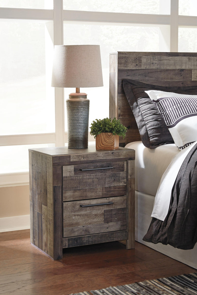 derekson-queen-panel-storage-bed-2-chests-and-2-nightstands-7