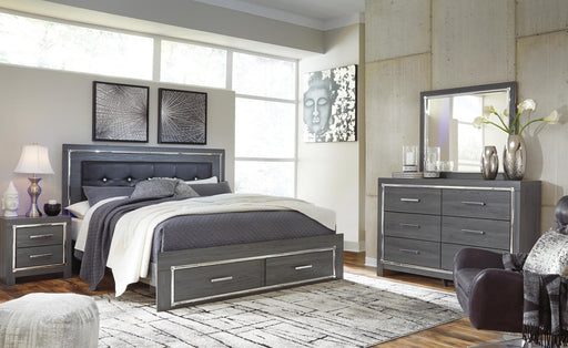 lodanna-king-upholstered-storage-bed-dresser-mirror-chest-and-nightstand-1