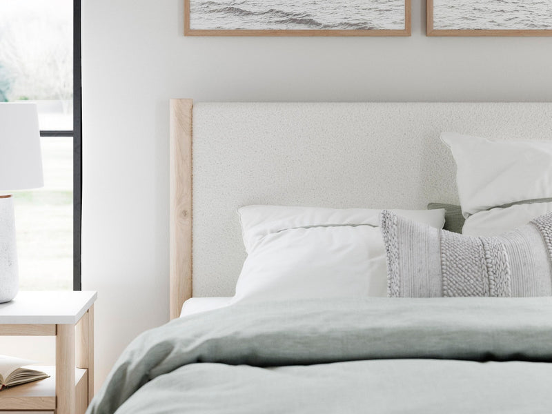 cadmori-queen-upholstered-panel-bed-9