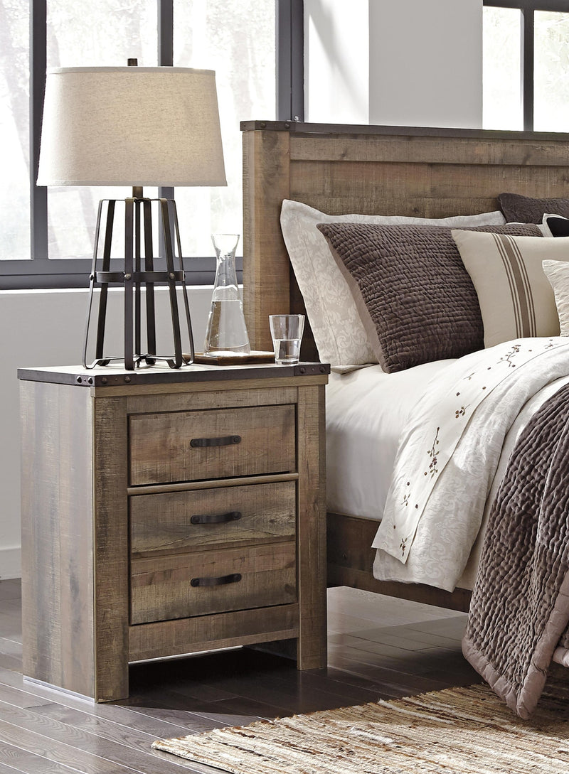 trinell-king-panel-bed-chest-and-2-nightstands-11