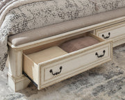 realyn-king-upholstered-panel-bed-dresser-mirror-and-nightstand-15