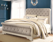 realyn-king-upholstered-sleigh-bed-dresser-mirror-and-2-nightstands-15