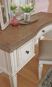 realyn-queen-upholstery-panel-bed-dresser-chest-nightstand-and-vanity-set-22