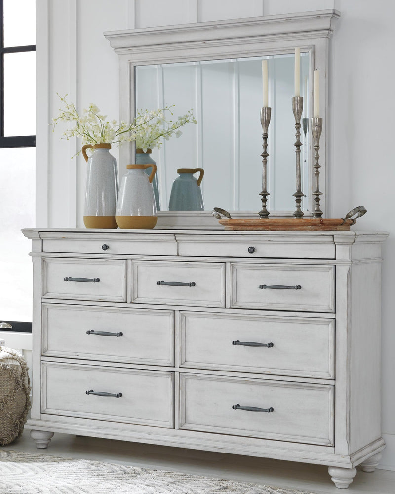 kanwyn-king-upholstered-panel-bed-dresser-mirror-and-chest-13