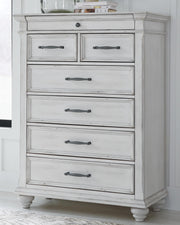 kanwyn-king-upholstered-panel-bed-dresser-mirror-and-chest-14