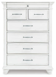 kanwyn-king-upholstered-panel-bed-dresser-mirror-and-chest-7