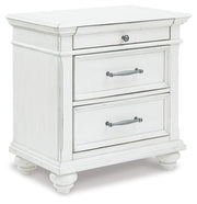 kanwyn-king-panel-storage-bed-chest-and-nightstand-8