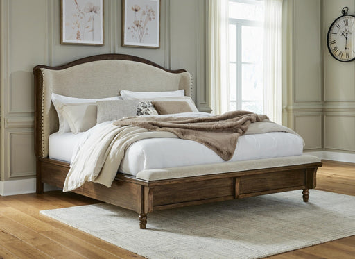 sturlayne-california-king-upholstered-panel-bed-2