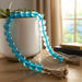 glass-34x1-beaded-garland-w-tassel-blue-11