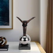 metal-12-balancing-man-on-sphere-bronze-12