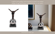 metal-12-balancing-man-on-sphere-bronze-13