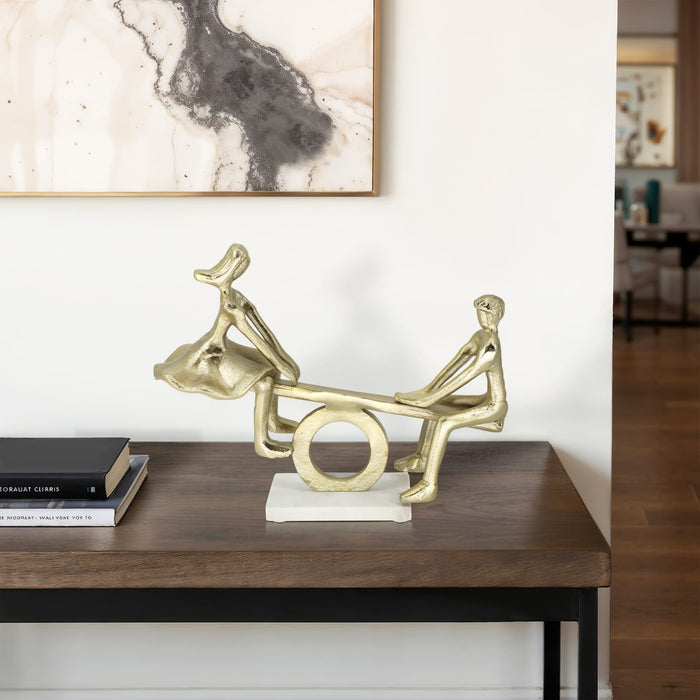 metal-15-couple-on-see-saw-gold-10