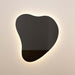 phoebe-led-teardrop-black-tinted-wall-mirror-1