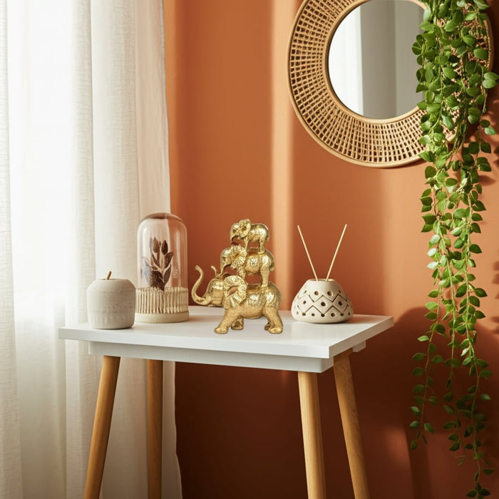 resin-10-stacked-raised-trunk-elephants-gold-10