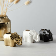 s-3-7-9-oz-plumeria-elephant-candle-multi-12